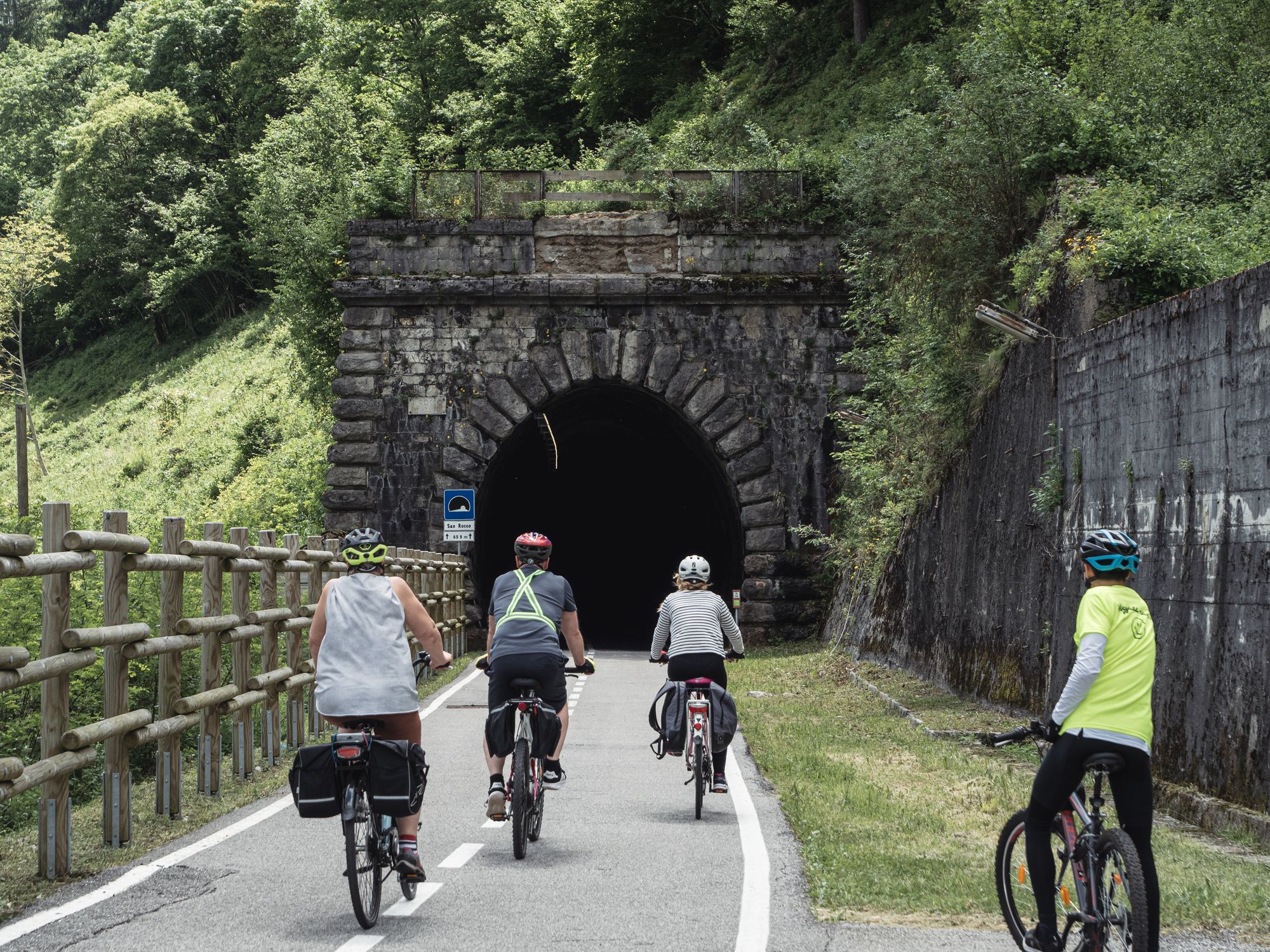 Four cyclists enjoying Italy