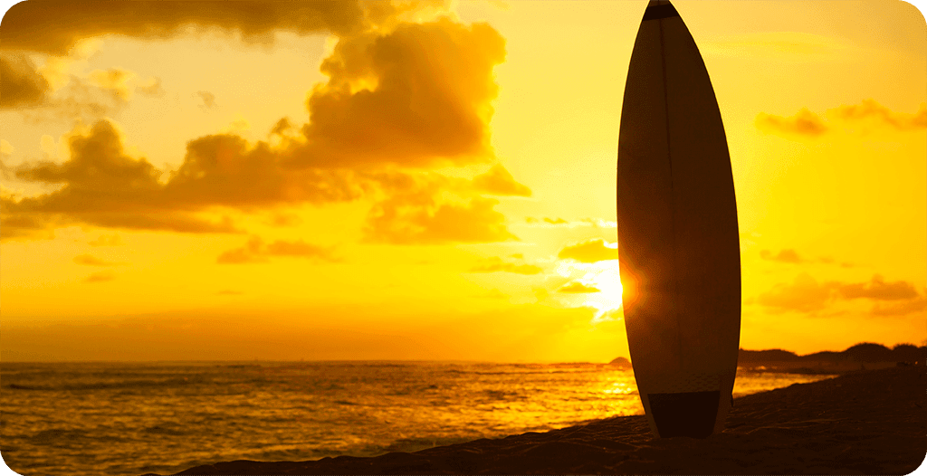 Single surfboard in the sunset ocean view